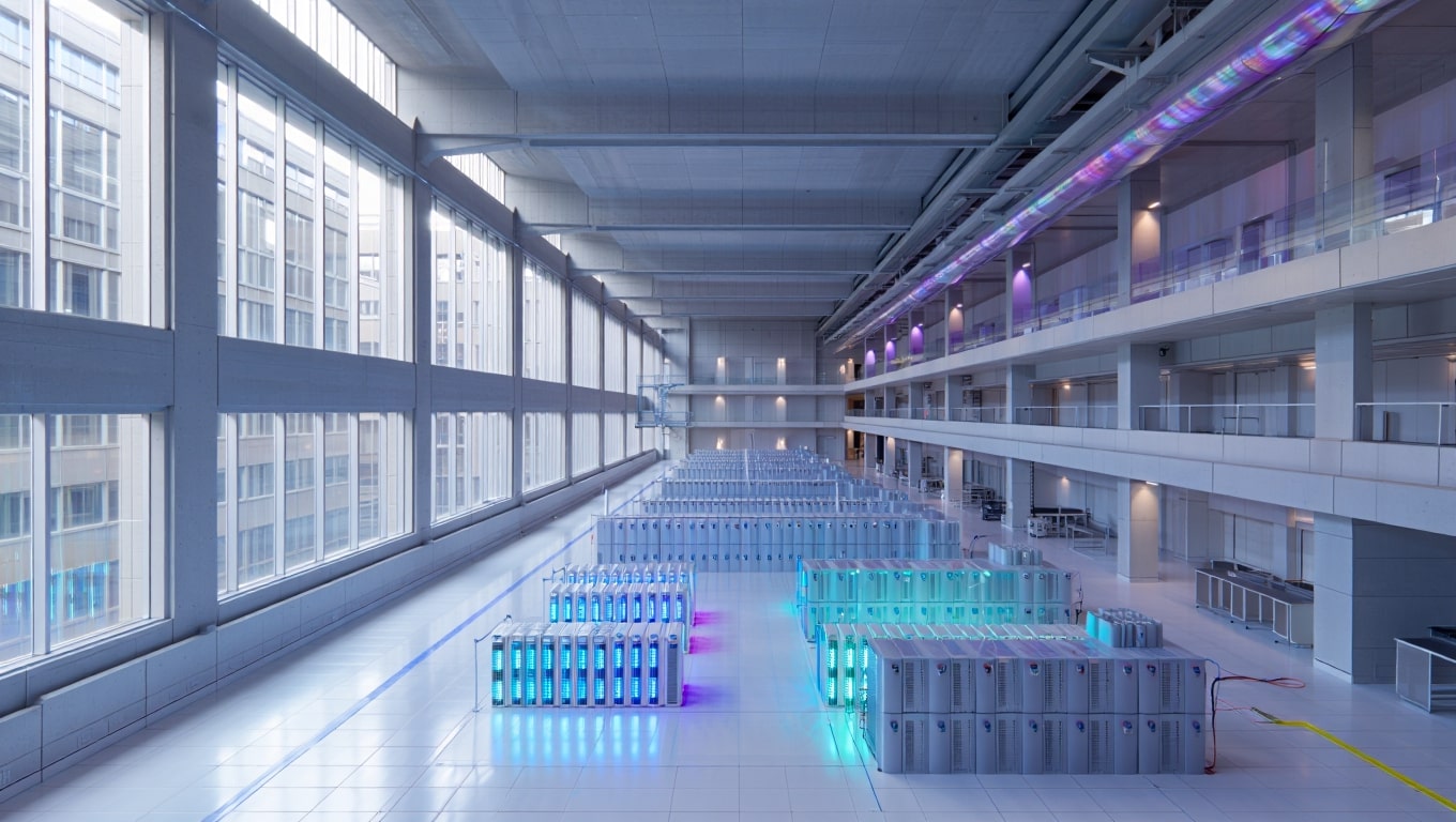modern-data-center-with-rows-of-illuminated-servers-and-vast-windows